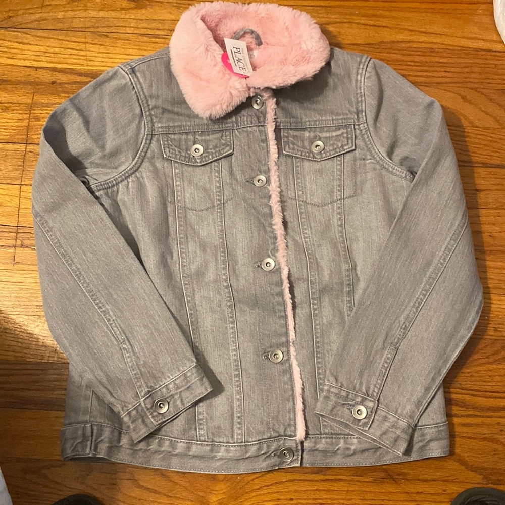 Jean jacket with sequins heart of the back lined with pink fur